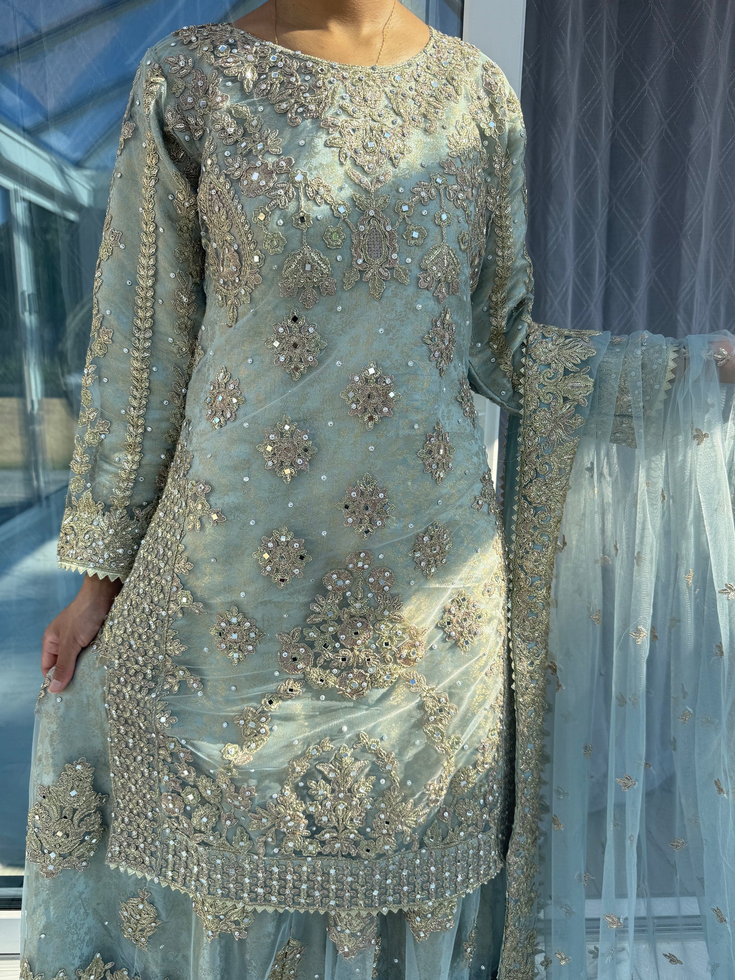 DUNIYA - Embroidered net kameez and lengha with brocade lining