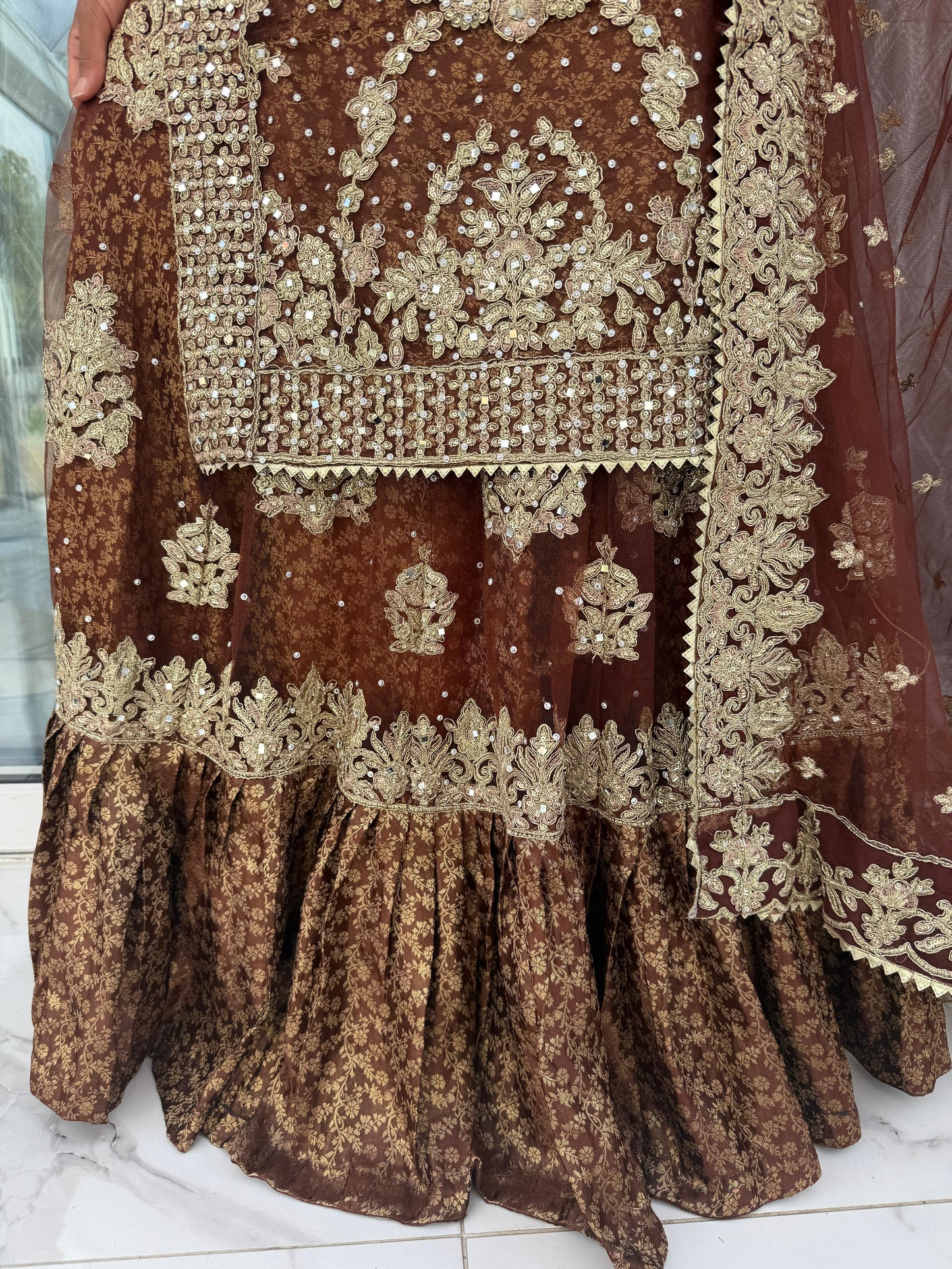 DUNIYA BROWN - Embroidered net kameez and lengha with brocade lining