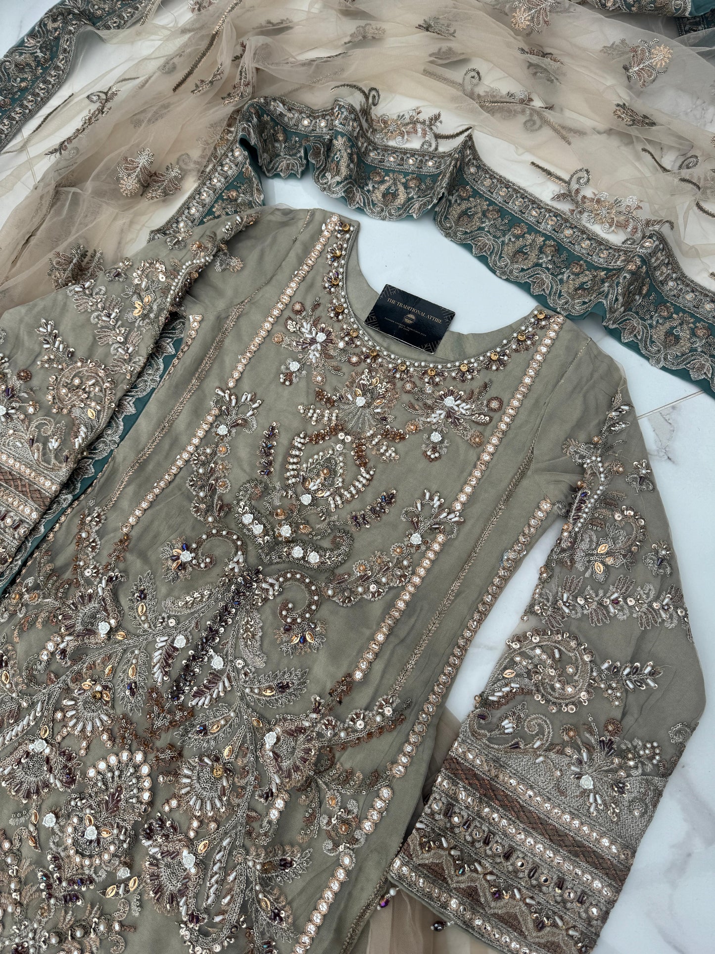 ALIYNA - Heavy embroidered net kameez with Sharara