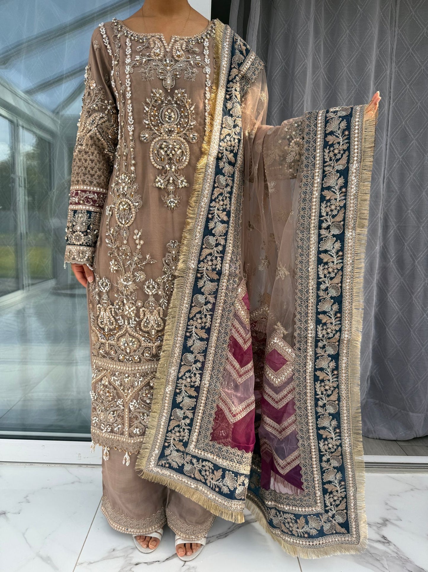 AINAZ - Heavy embroidered net kameez with handwork