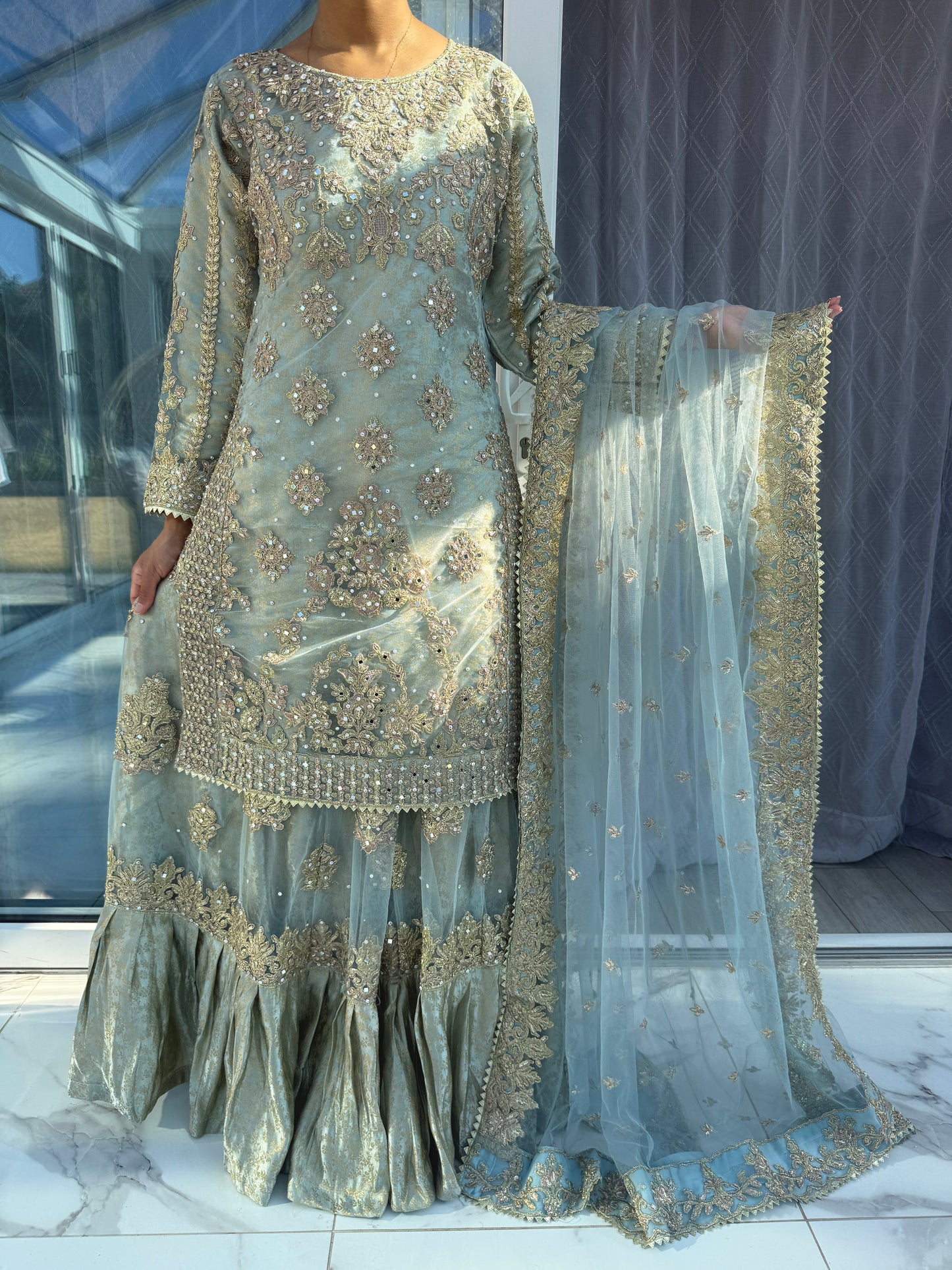 DUNIYA - Embroidered net kameez and lengha with brocade lining