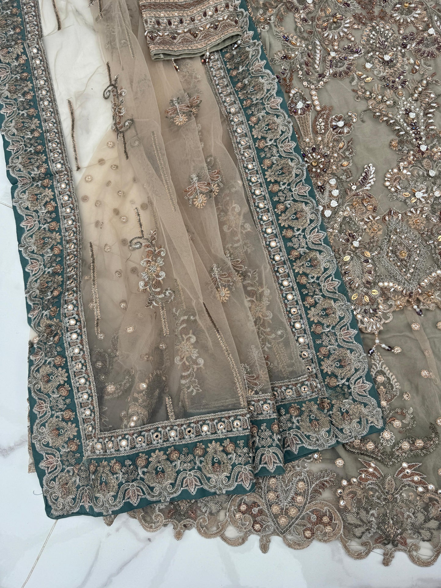 ALIYNA - Heavy embroidered net kameez with Sharara