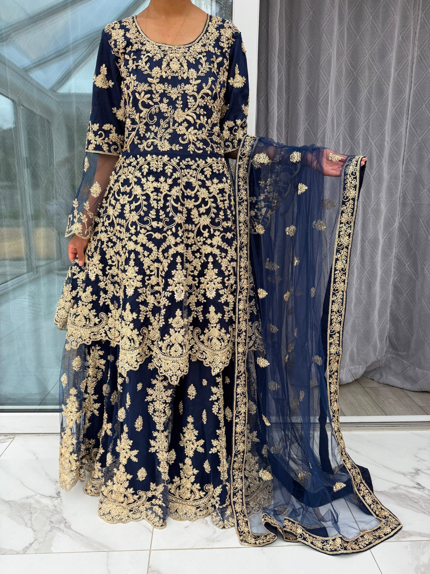 MAHNOOR NAVY BLUE - Embroidered net peplum dress with Sharara