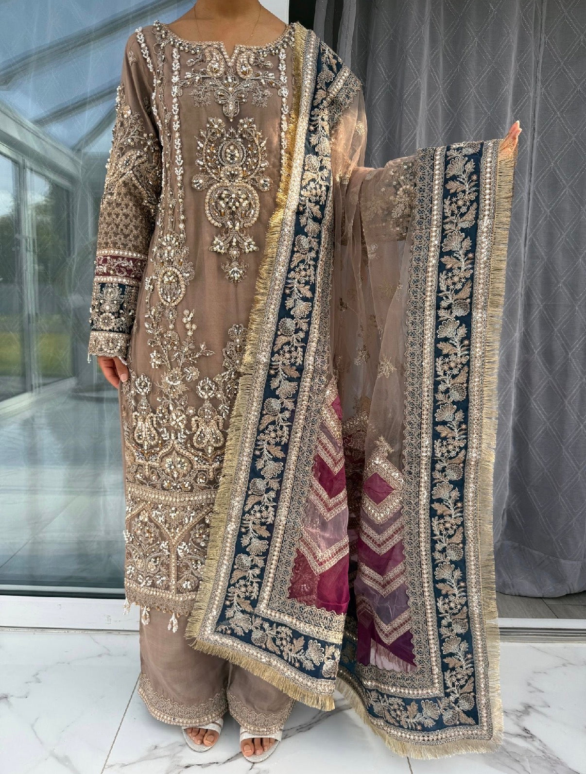 AINAZ - Heavy embroidered net kameez with handwork