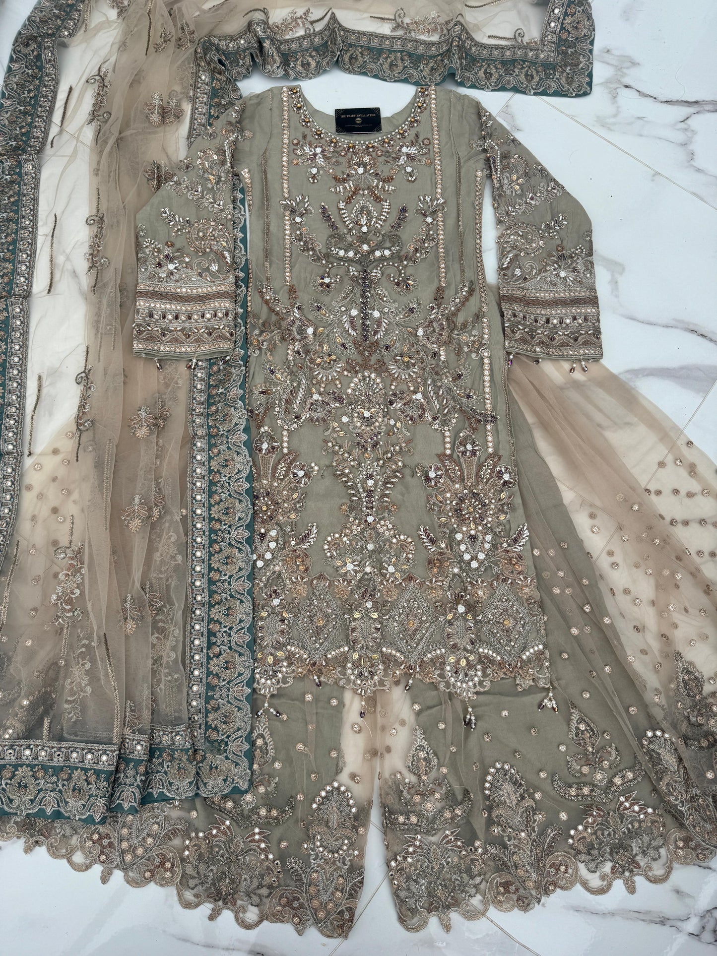 ALIYNA - Heavy embroidered net kameez with Sharara