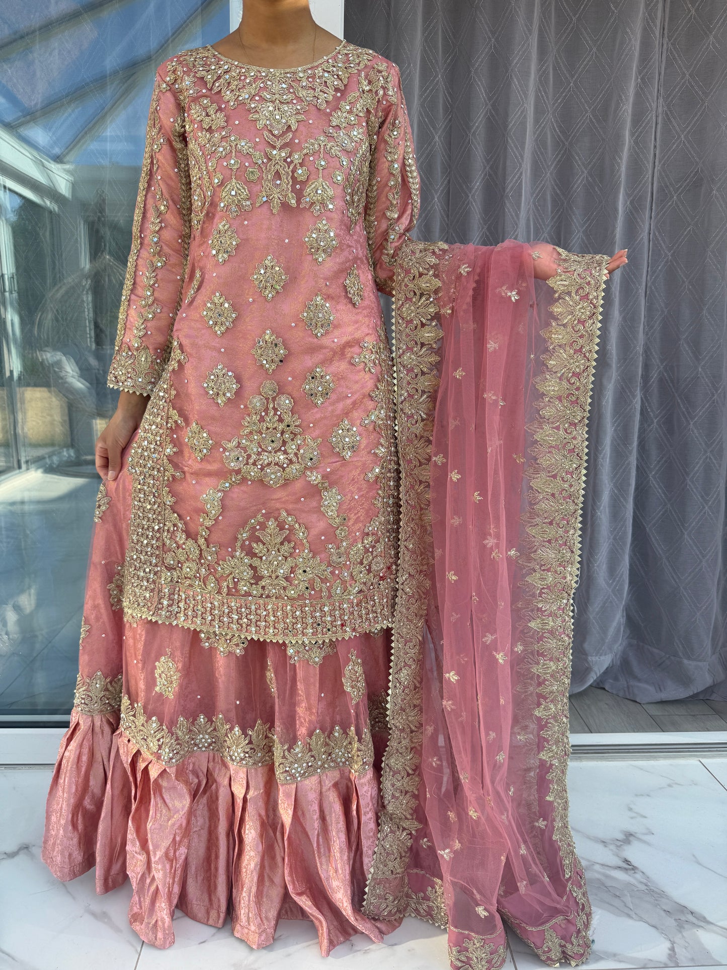 DUNIYA - Embroidered net kameez and lengha with brocade lining