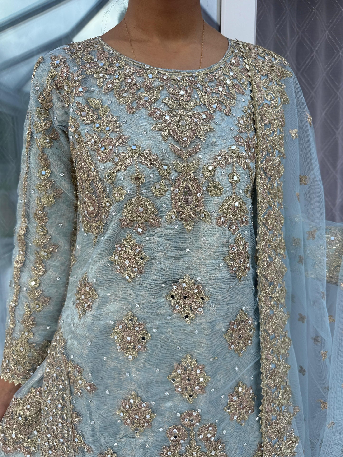DUNIYA - Embroidered net kameez and lengha with brocade lining