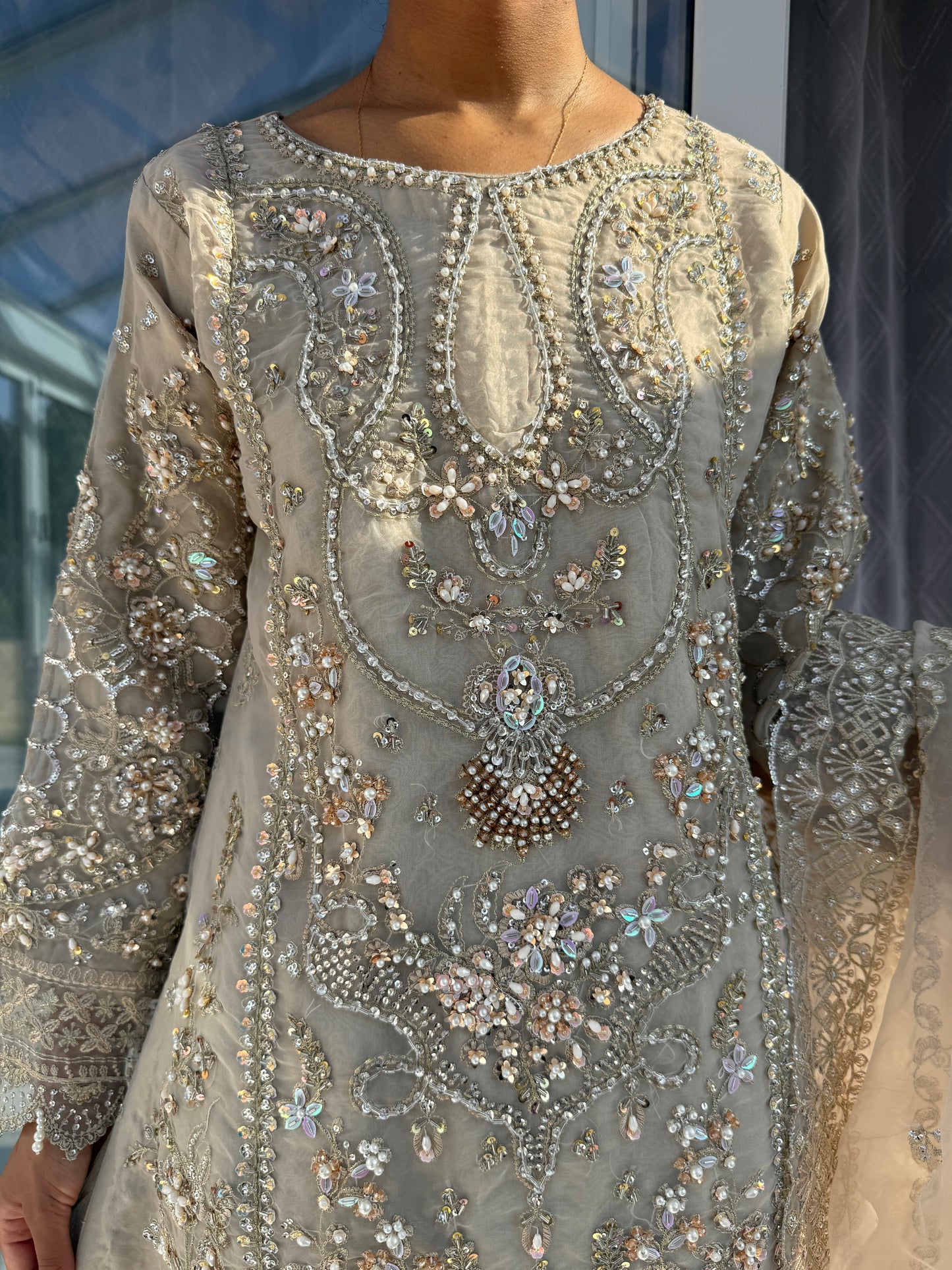 ANIQA BEIGE - Embroidered organza kameez with handwork and Kali Sharara