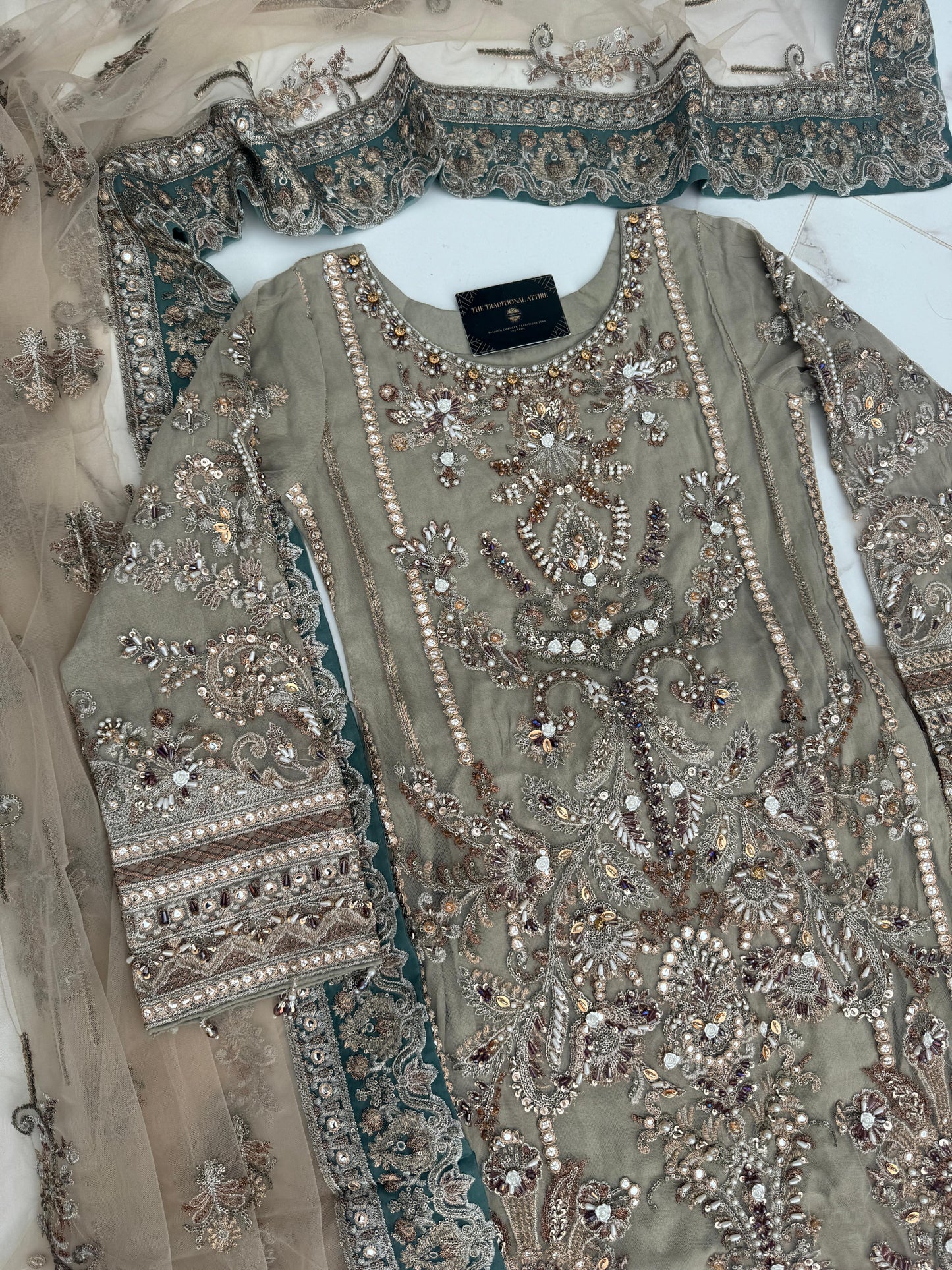 ALIYNA - Heavy embroidered net kameez with Sharara
