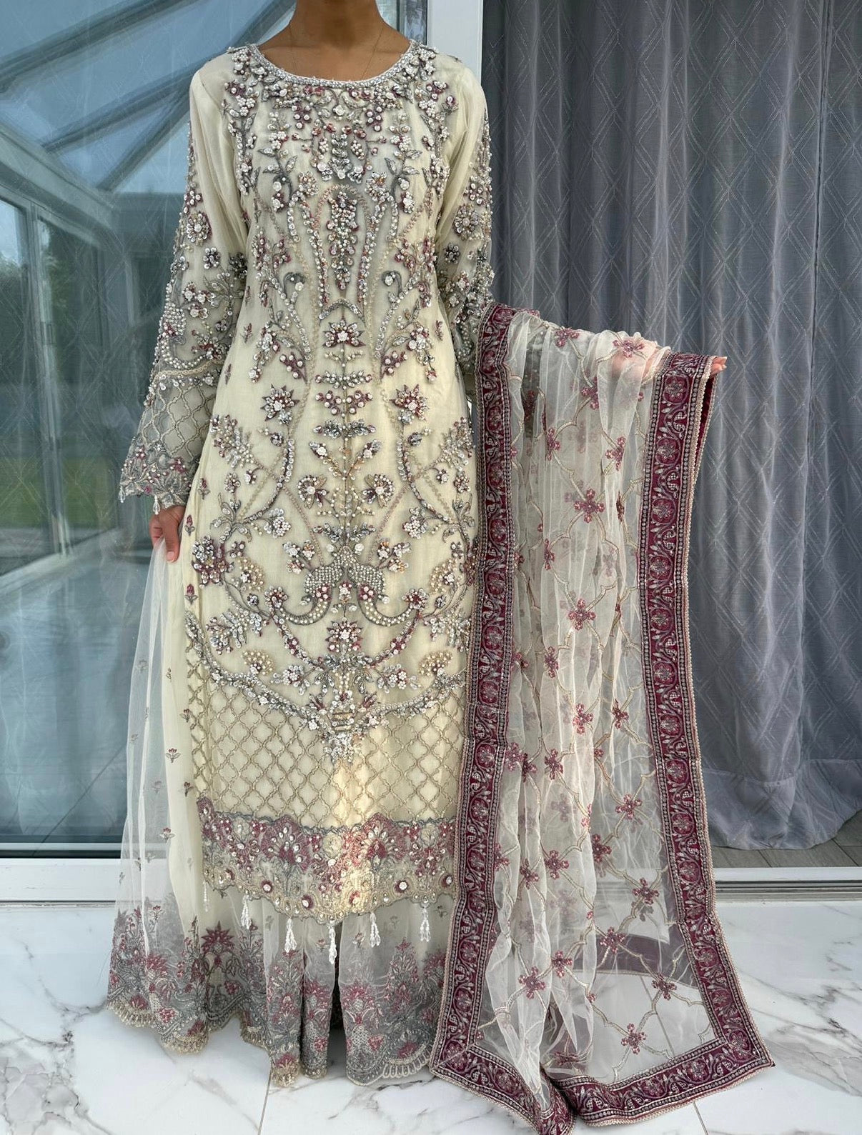 SAMAYA - Heavy embroidered net kameez with sharara