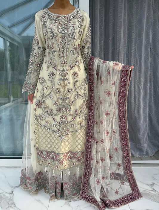 SAMAYA - Heavy embroidered net kameez with sharara