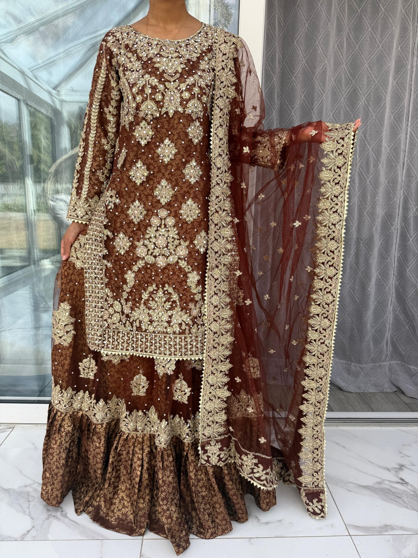 DUNIYA BROWN - Embroidered net kameez and lengha with brocade lining