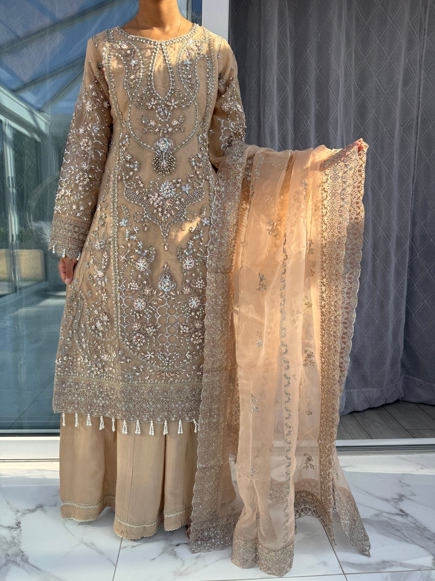 ANIQA WARM SAND - Embroidered organza kameez with handwork and Kali Sharara