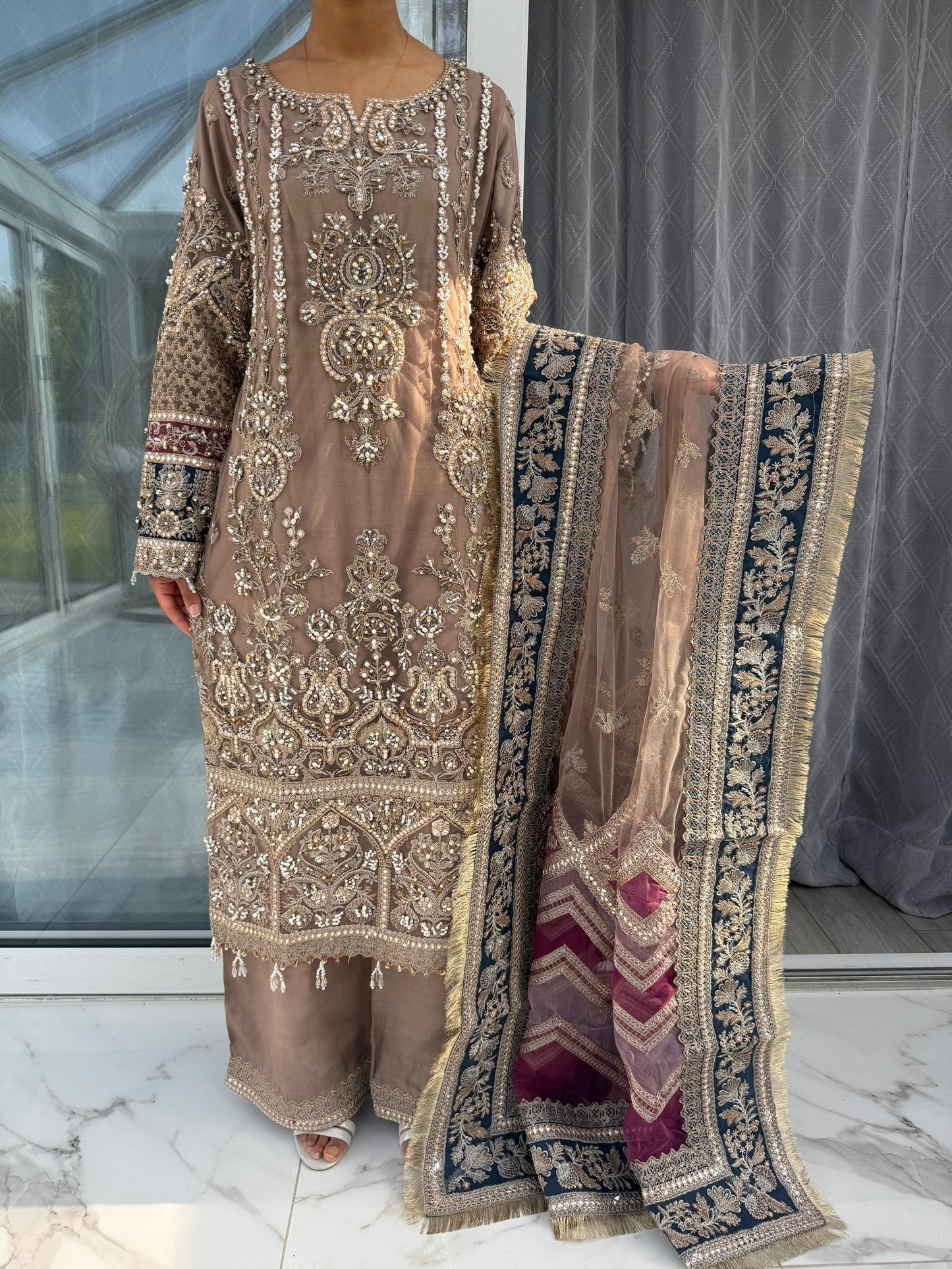 AINAZ - Heavy embroidered net kameez with handwork