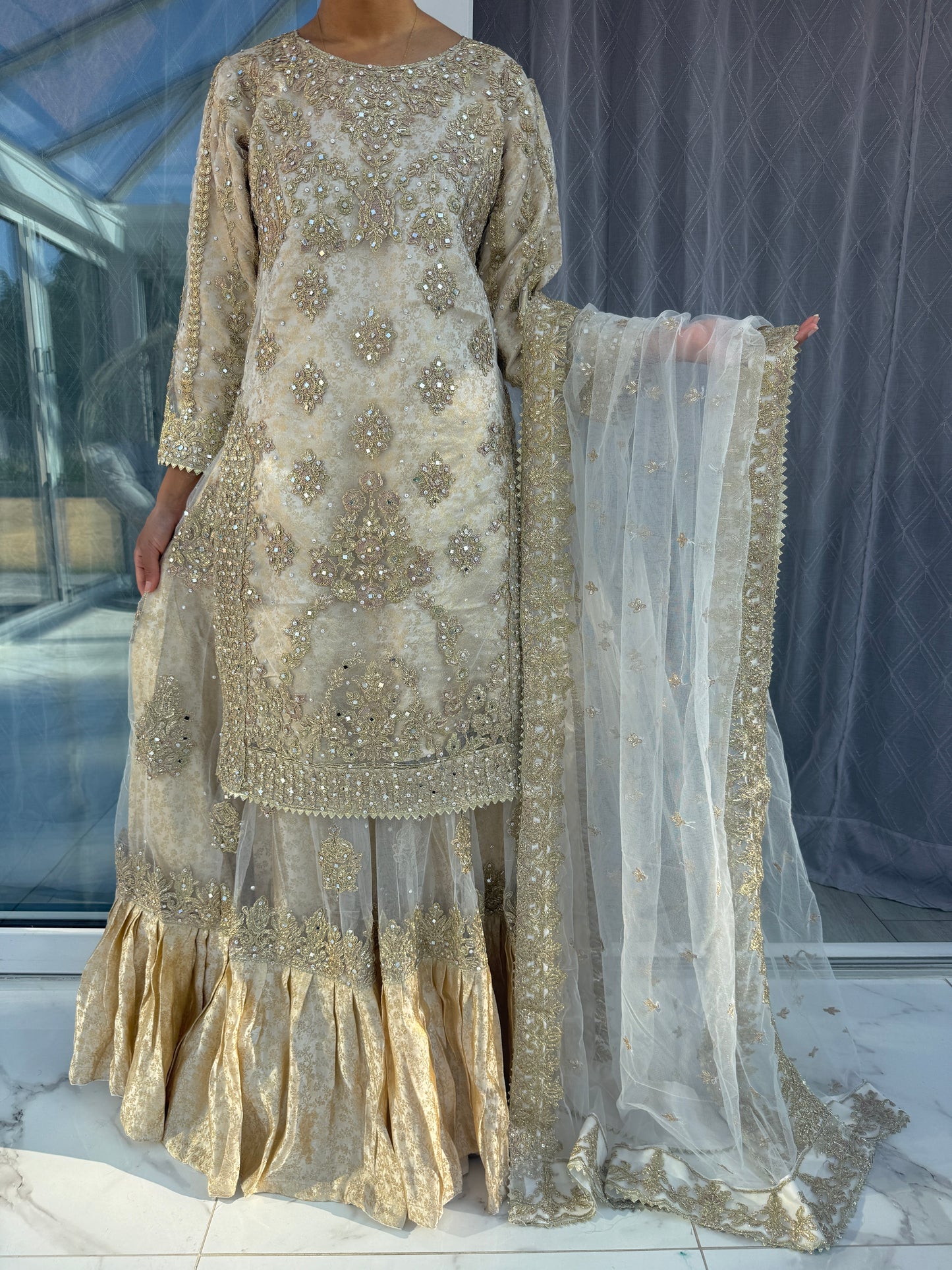 DUNIYA - Embroidered net kameez and lengha with brocade lining