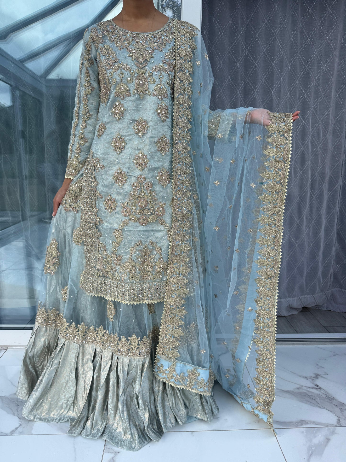 DUNIYA - Embroidered net kameez and lengha with brocade lining