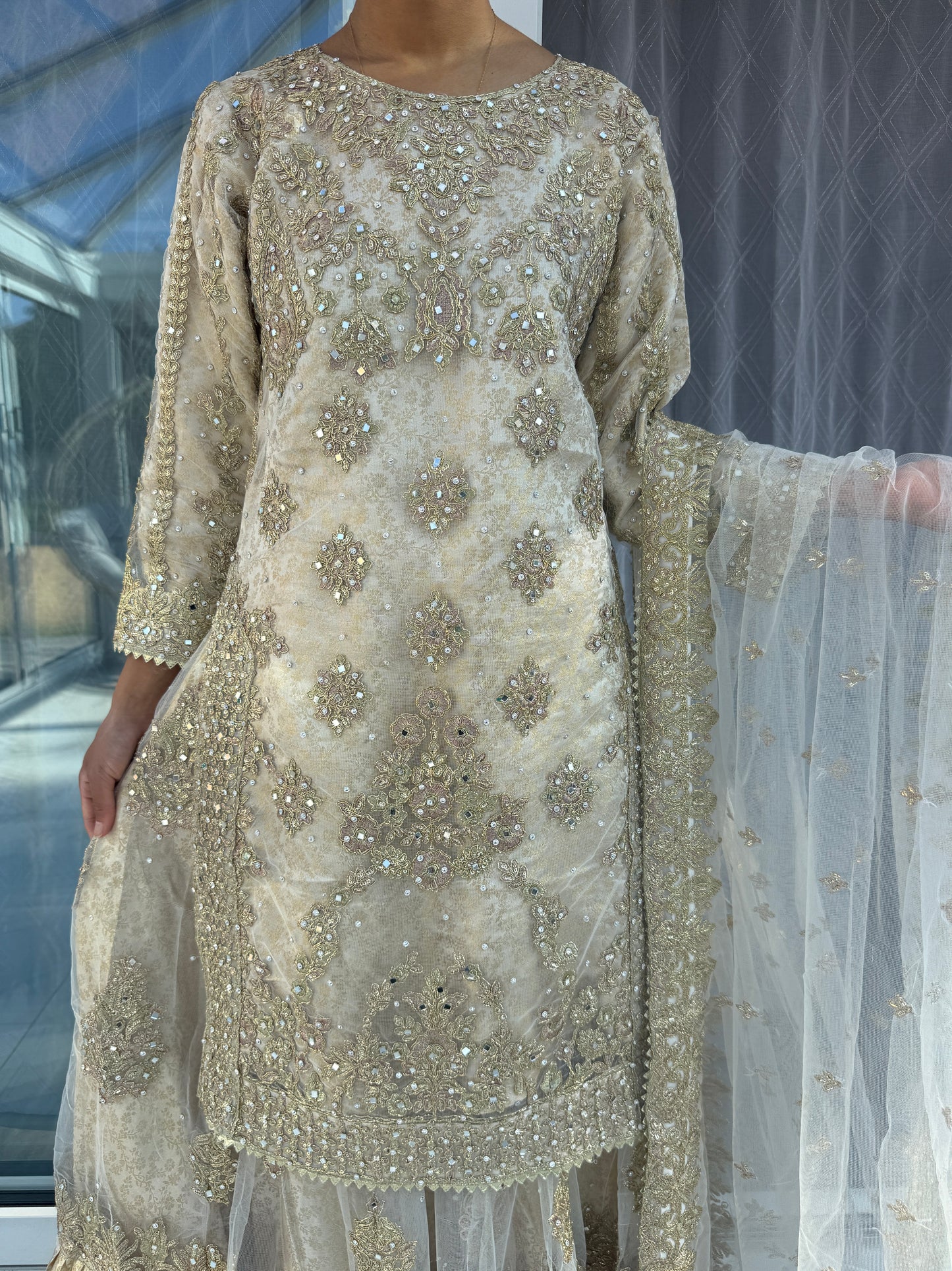 DUNIYA - Embroidered net kameez and lengha with brocade lining