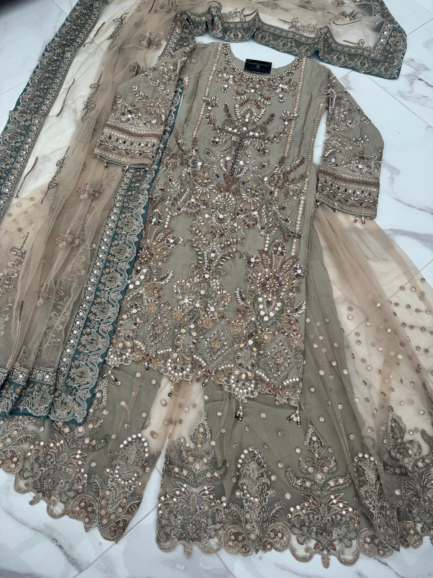 ALIYNA - Heavy embroidered net kameez with Sharara